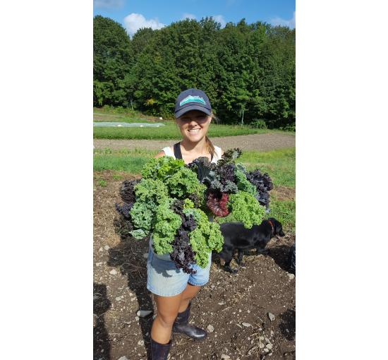Annie Metzger From Laughing Earth Farm Holding Kale