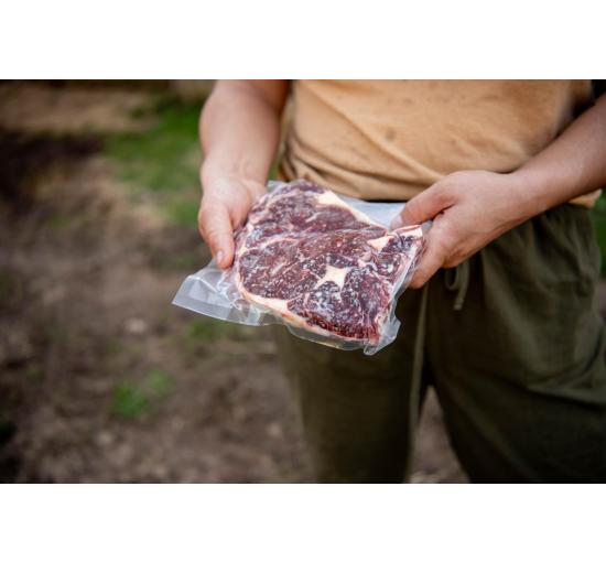 Holding our pasture- raised beef. 