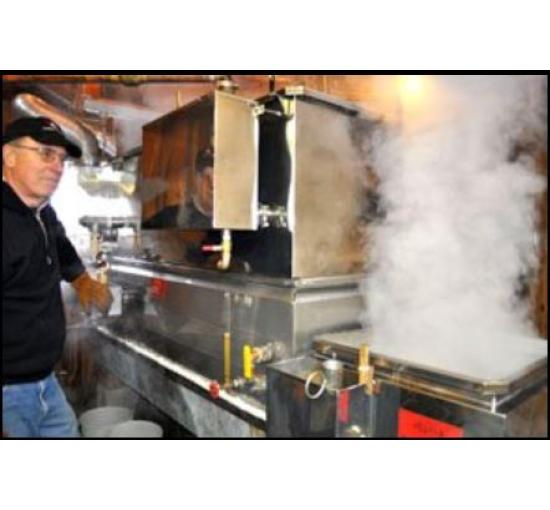 man boiling maple