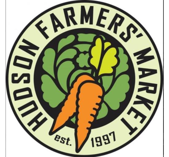 circle logo with carrots on the middle with black font around circle