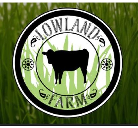 green grass background circle logo with cow in middle then a smaller circle with black font