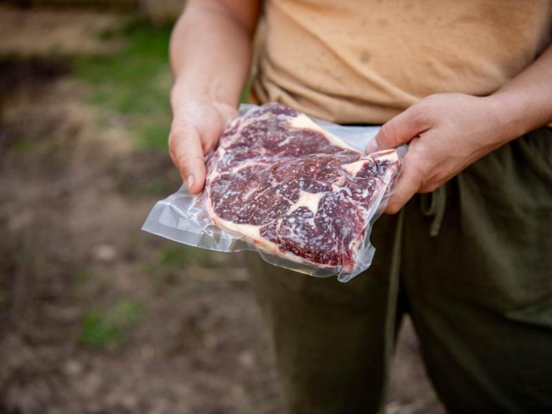 Holding our pasture- raised beef. 