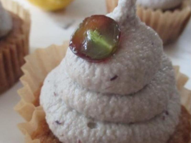Cupcake with a sliced grape on top