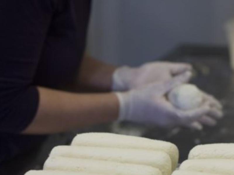 cheese logs being made