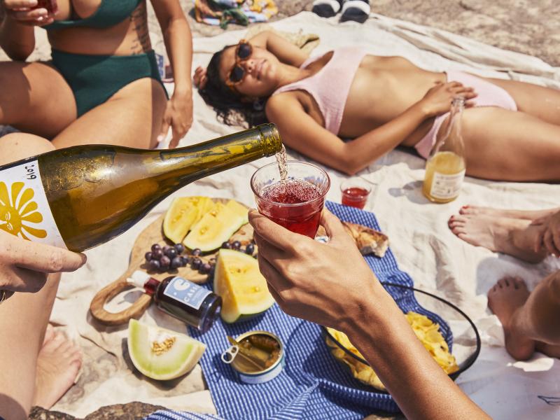 image of someone pouring into a wine glass