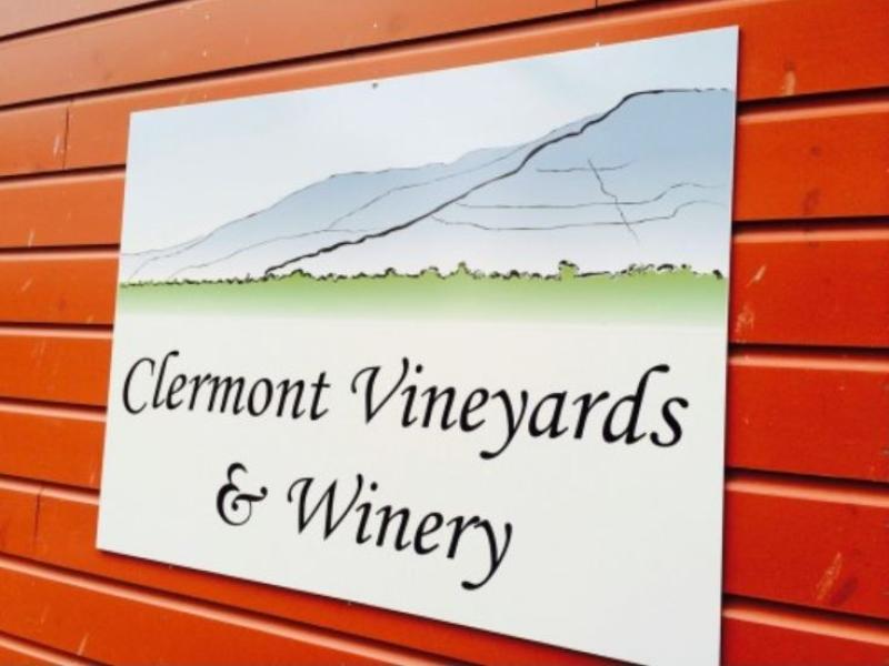 sign on red barn