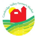 Circle logo white background with a red barn and yellow sun behind barn and swirly grass