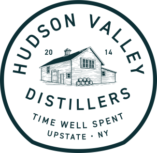 Logo circle with words around in black font with a drawing of the distillery