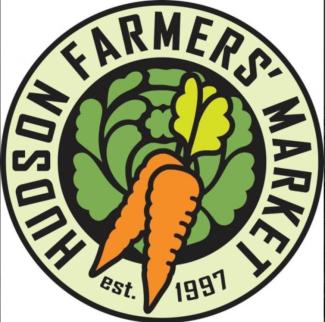circle logo with carrots on the middle with black font around circle