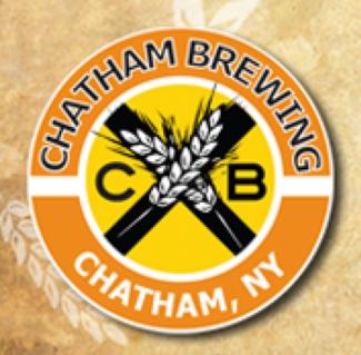 circle logo with brown and orange white and black font with wheat
