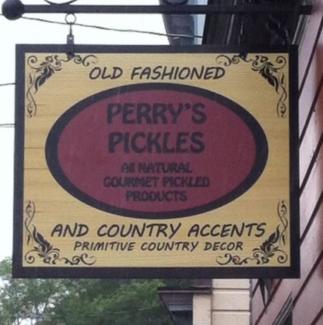 sign from store red oval with black font